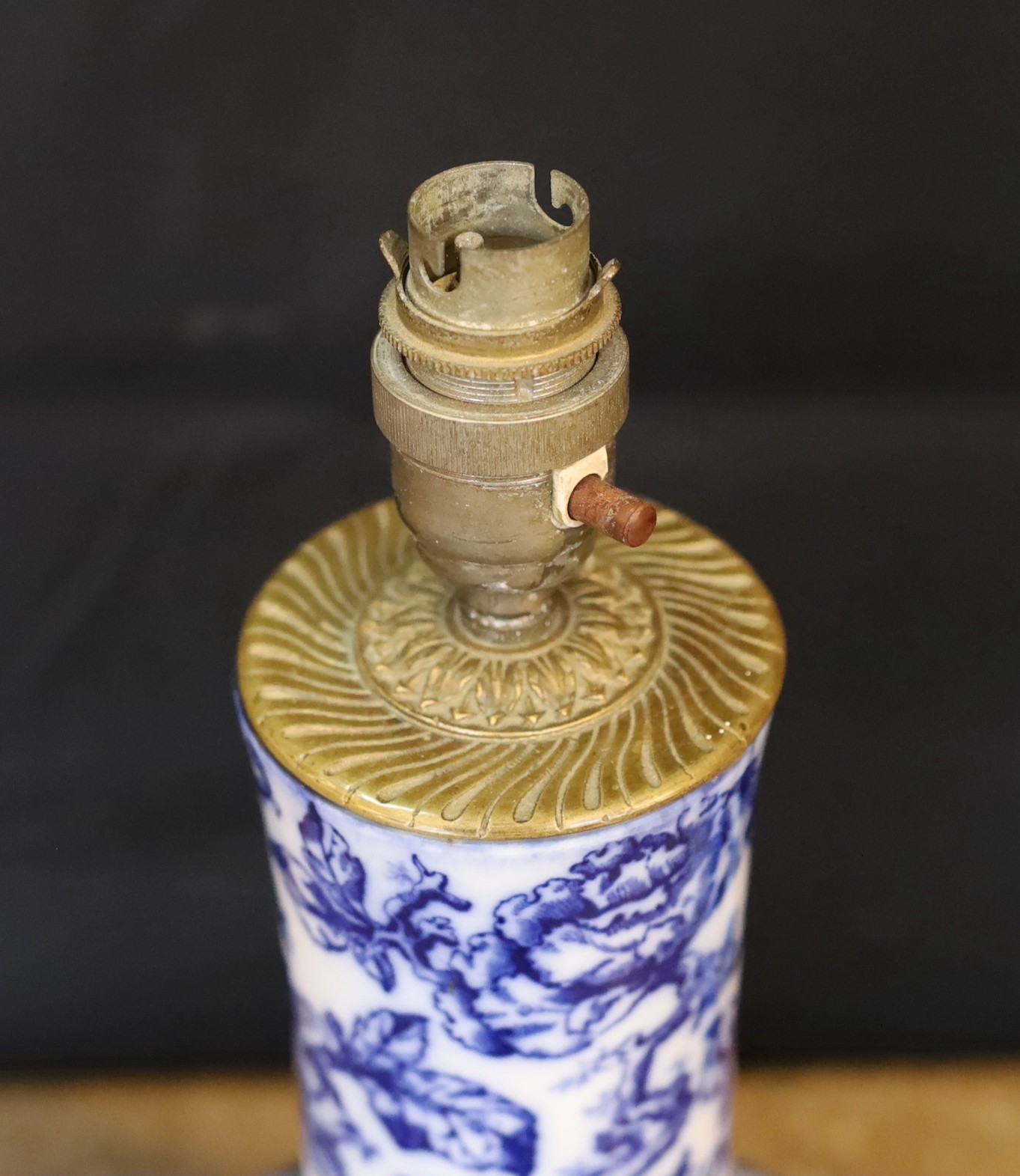 A Victorian mounted blue and white ceramic lamp base, height 38cm